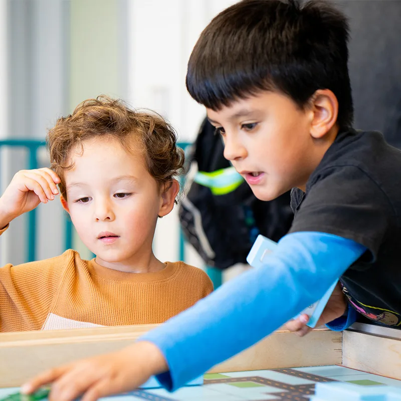 Children play with building blocks.