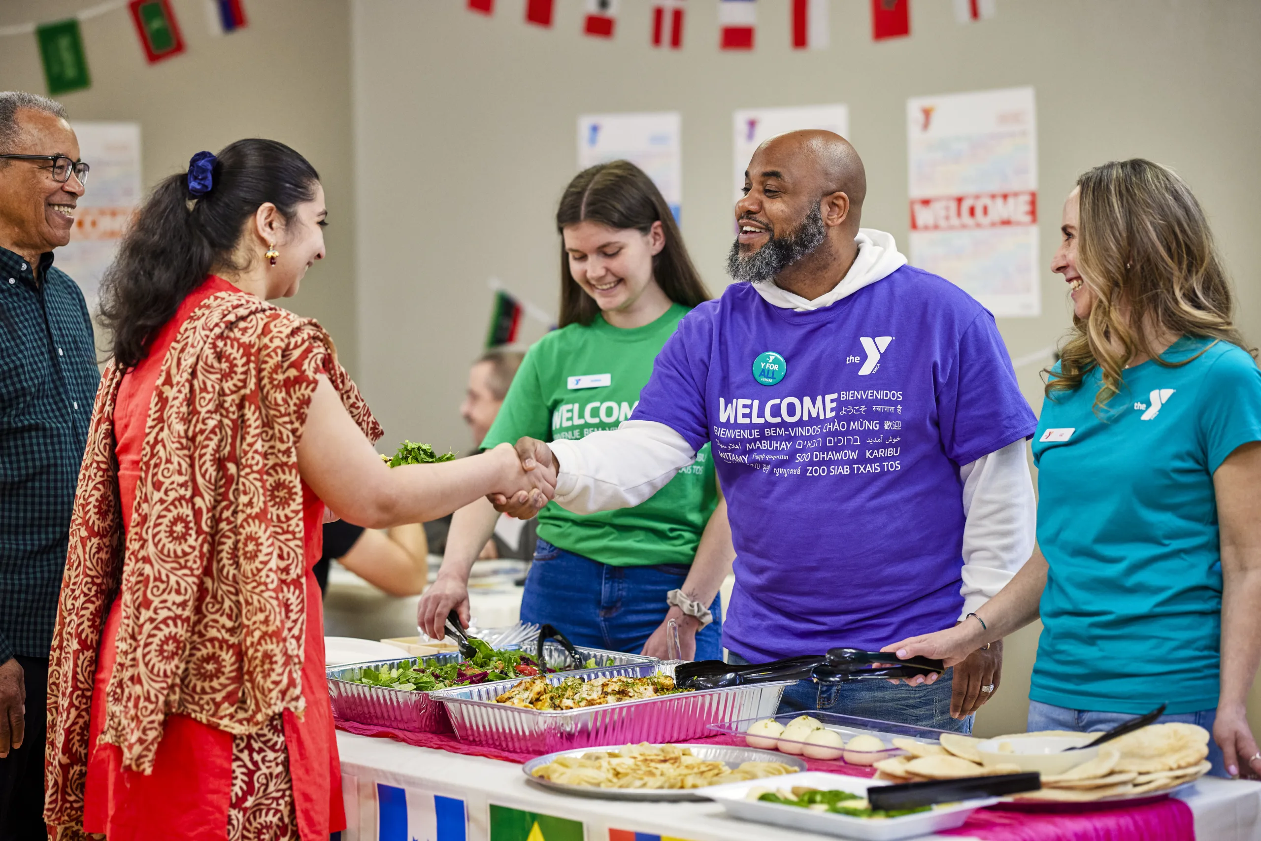 YMCA community bonds over international potluck.