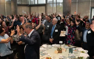 Gratitude luncheon attendees celebrating