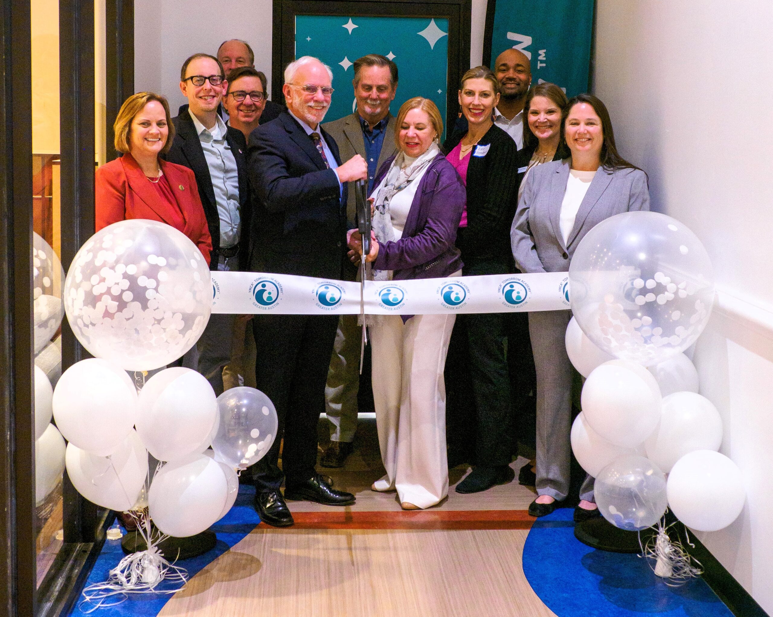 Greater Austin YMCA leadership and community partners cut the ribbon at Tomorrow Academy.